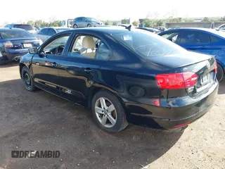 2012 Volkswagen Jetta TDI w/Premium with VIN 3VWLL7AJ3CM469621, listed as a IAAI auction lot 41831230 with 198,871 mi miles and . Bid and sale history available at DreamBid. Image 3.