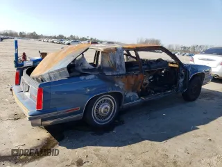 1988 Cadillac DeVille z VIN 1G6CD1156J4296091, wystawiony jako Copart lot #46307265 z przebiegiem Nie podano mil oraz Szkoda całkowita • Salvage title. Historia ofert i sprzedaży dostępna na DreamBid. Obrazek 3.