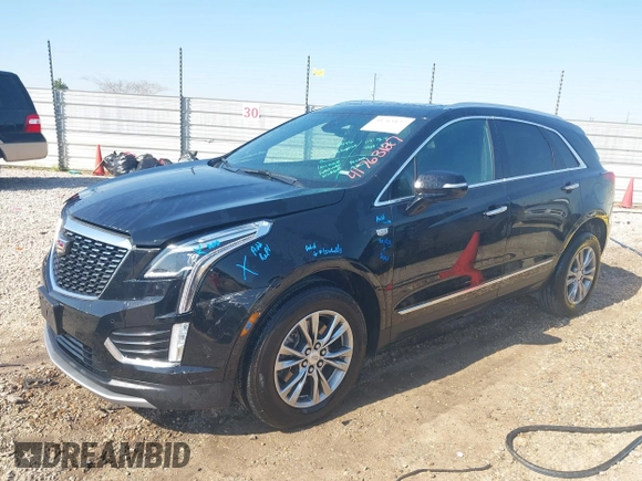 2023 Cadillac XT5 AWD Premium Luxury with VIN 1GYKNDRS7PZ158566, listed as a IAAI auction lot 41763127 with 58,248 mi miles and . Bid and sale history available at DreamBid. Image 2.