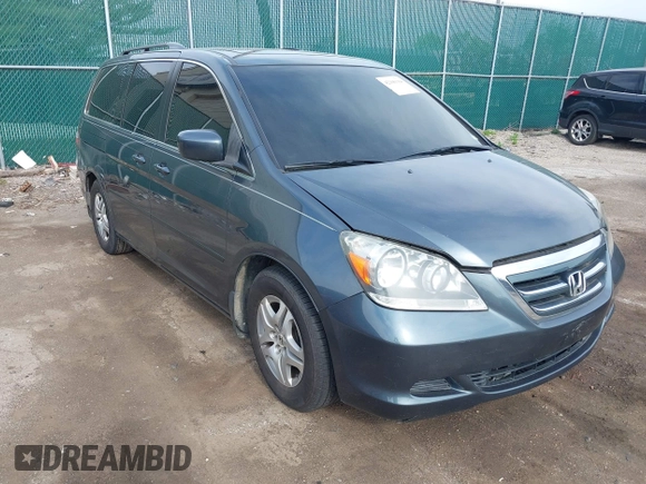 2005 Honda Odyssey EX-L with VIN 5FNRL38645B421253, listed as a IAAI auction lot 42106184 with 157,717 mi miles. Bid and sale history available at carsss.com. Image 1.