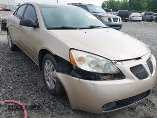 2006 Pontiac G6 6-Cyl z VIN 1G2ZG558164137405, wystawiony jako IAAI lot #42210341 z przebiegiem 225 764 mil mil oraz . Historia ofert i sprzedaży dostępna na DreamBid. Obrazek 6.