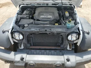 2015 Jeep Wrangler Unlimited Sport with VIN 1C4BJWDG2FL545561, listed as a Copart auction lot 60574045 with 83,592 mi miles and Salvage title. Bid and sale history available at DreamBid. Image 12.