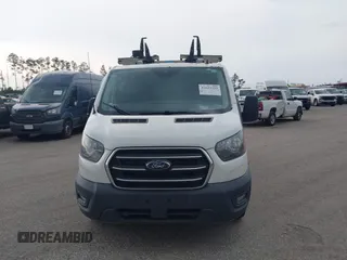 2020 Ford Transit Cargo with VIN 1FTBR1Y8XLKA19646, listed as a IAAI auction lot 42633323 with 82,577 mi miles and . Bid and sale history available at DreamBid. Image 12.
