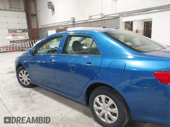 2009 Toyota Corolla with VIN JTDBL40E699037792, listed as a IAAI auction lot 41838231 with 199,690 mi miles. Bid and sale history available at carsss.com. Image 13.