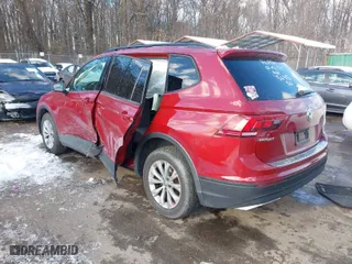 2019 Volkswagen Tiguan S with VIN 3VV1B7AX6KM075645, listed as a IAAI auction lot 41271492 with 73,663 mi miles. Bid and sale history available at carsss.com. Image 3.