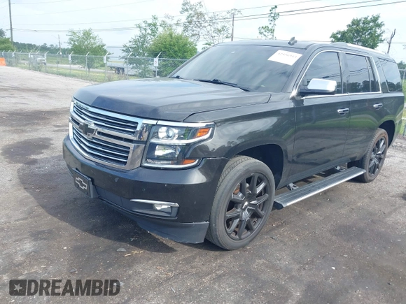 2015 Chevrolet Tahoe LTZ with VIN 1GNSCCKC5FR103676, listed as a IAAI auction lot 42456913 with 214,009 mi miles and . Bid and sale history available at DreamBid. Image 16.