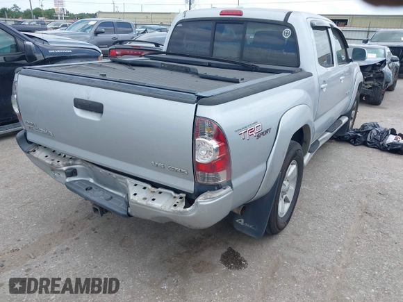2009 Toyota Tacoma with VIN 3TMLU42N69M032320, listed as a IAAI auction lot 42280196 with 214,720 mi miles and . Bid and sale history available at DreamBid. Image 4.