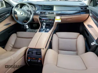 2011 BMW 7 Series 740i with VIN WBAKA4C59BC392351, listed as a Copart auction lot 84942304 with 76,874 mi miles and Salvage Title. Bid and sale history available at carsss.com. Image 8.
