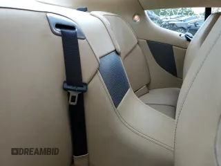 2005 Aston Martin DB9 z VIN SCFAD01A95GA02851, wystawiony jako Copart lot #63535783 z przebiegiem 40 729 mil mil oraz . Historia ofert i sprzedaży dostępna na DreamBid. Obrazek 10.