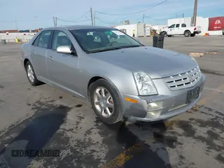 2007 Cadillac STS z VIN 1G6DW677170180415, wystawiony jako IAAI lot #41357298 z przebiegiem 165 666 mil mil oraz . Historia ofert i sprzedaży dostępna na DreamBid. Obrazek 1.