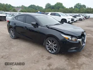 2018 Mazda 3 Touring z VIN 3MZBN1V38JM255963, wystawiony jako IAAI lot #42436747 z przebiegiem 77 983 mil mil oraz . Historia ofert i sprzedaży dostępna na DreamBid. Obrazek 1.