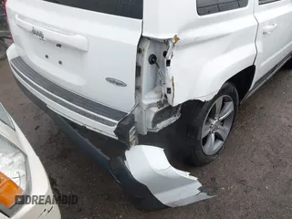 2016 Jeep Patriot Latitude with VIN 1C4NJPFAXGD749306, listed as a IAAI auction lot 41474439 with 94,767 mi miles and . Bid and sale history available at DreamBid. Image 6.