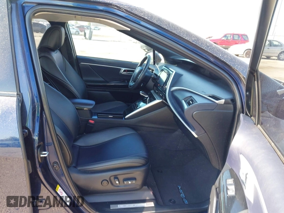 2016 Toyota Mirai with VIN JTDBVRBD6GA000989, listed as a IAAI auction lot 42098383 with 63,686 mi miles and . Bid and sale history available at DreamBid. Image 5.