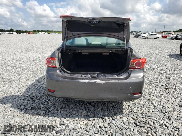 2013 Toyota Corolla L with VIN 5YFBU4EE9DP181829, listed as a Copart auction lot 54594115 with 185,546 mi miles and Salvage Title. Bid and sale history available at DreamBid. Image 6.