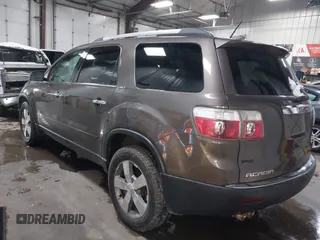 2011 GMC Acadia SLT1 with VIN 1GKKRREDXBJ331099, listed as a IAAI auction lot 41950066 with 128,067 mi miles. Bid and sale history available at carsss.com. Image 3.