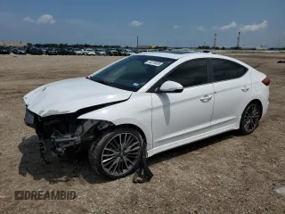 2018 Hyundai Elantra Sport с VIN KMHD04LB6JU508954, выставлен на аукционе Copart как лот 54615935 с пробегом 74 478 миль миль и Списание • Salvage title. История ставок и продаж доступна на DreamBid. Изображение 1.