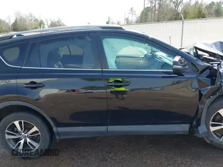 2018 Toyota RAV4 XLE with VIN 2T3WFREVXJW444002, listed as a IAAI auction lot 41795600 with 115,120 mi miles. Bid and sale history available at carsss.com. Image 13.