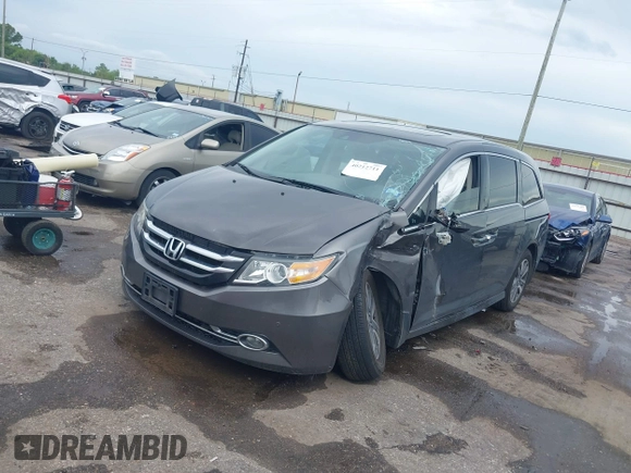 2016 Honda Odyssey Touring Elite with VIN 5FNRL5H97GB010048, listed as a IAAI auction lot 40212711 with 119,009 mi miles and . Bid and sale history available at DreamBid. Image 17.