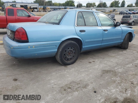 2004 Ford Police Interceptor Base w/3.27 Axle with VIN 2FAFP71W44X176595, listed as a Copart auction lot 72642164 with 136,019 mi miles and Salvage title. Bid and sale history available at DreamBid. Image 3.