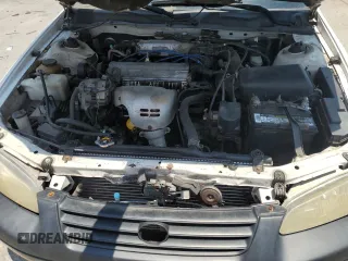 1998 Toyota Camry LE z VIN JT2BG22K9W0145537, wystawiony jako Copart lot #59018505 z przebiegiem 301 595 mil mil oraz Czysty tytuł • Clean title. Historia ofert i sprzedaży dostępna na DreamBid. Obrazek 11.