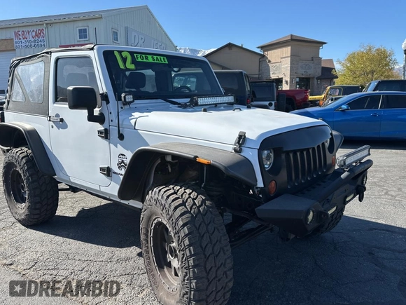2012 Jeep Wrangler Sport with VIN 1C4GJWAG5CL201499, listed as a Copart auction lot 55247615 with 116,414 mi miles and Clean Title. Bid and sale history available at carsss.com. Image 1.