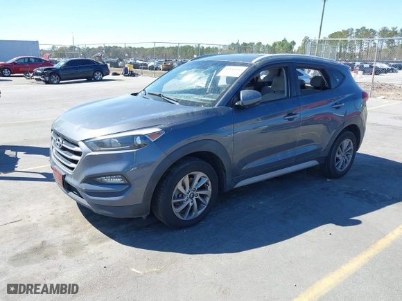 2018 Hyundai Tucson SEL with VIN KM8J3CA48JU718402, listed as a IAAI auction lot 41810363 with 218,853 mi miles. Bid and sale history available at carsss.com. Image 20.
