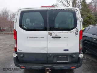 2016 Ford Transit Wagon XL with VIN 1FBZX2ZM9GKB00914, listed as a IAAI auction lot 41731358 with 286,717 mi miles. Bid and sale history available at carsss.com. Image 16.