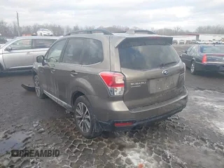 2017 Subaru Forester Touring with VIN JF2SJGWC1HH581460, listed as a IAAI auction lot 41326532 with 59,454 mi miles. Bid and sale history available at carsss.com. Image 3.