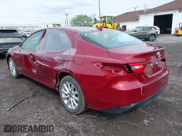 2019 Toyota Camry LE with VIN 4T1B11HK8KU823736, listed as a IAAI auction lot 42166696 with 21,732 mi miles and . Bid and sale history available at DreamBid. Image 3.