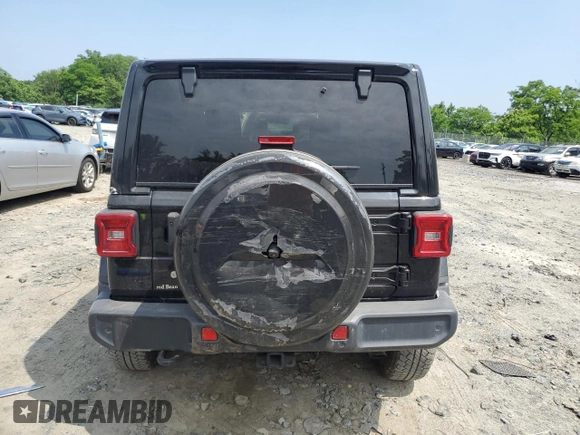 2019 Jeep Wrangler Unlimited Sahara with VIN 1C4HJXEN5KW523978, listed as a Copart auction lot 60188735 with 21,937 mi miles and Salvage title. Bid and sale history available at DreamBid. Image 6.