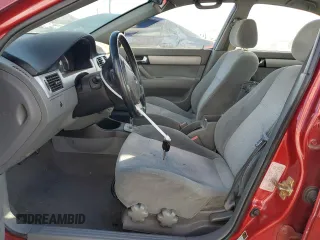 2005 Suzuki Forenza Premium z VIN KL5JJ56Z65K093127, wystawiony jako Copart lot #87691665 z przebiegiem 178 868 mil mil oraz Szkody całkowita. Historia ofert i sprzedaży dostępna na DreamBid. Obrazek 7.