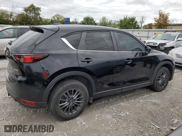2020 Mazda CX-5 Touring with VIN JM3KFBCM1L0792706, listed as a Copart auction lot 73032144 with 56,845 mi miles and Salvage Title. Bid and sale history available at carsss.com. Image 3.