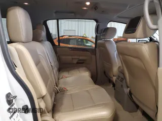 2014 Nissan Armada SV z VIN 5N1AA0NC6EN601343, wystawiony jako Copart lot #55153645 z przebiegiem 116 152 mil mil oraz Czysty tytuł • Clean title. Historia ofert i sprzedaży dostępna na DreamBid. Obrazek 11.