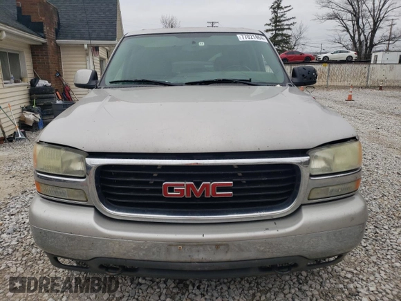 2004 GMC Yukon SLE with VIN 1GKEK13V14J136414, listed as a Copart auction lot 77021464 with 262,143 mi miles and Salvage Title. Bid and sale history available at carsss.com. Image 5.