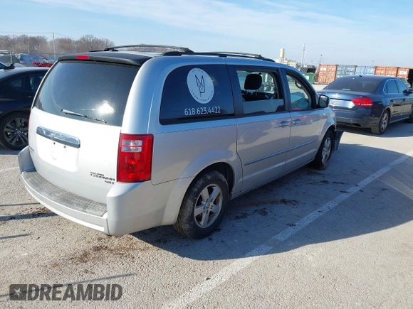 2010 Dodge Grand Caravan SXT with VIN 2D4RN5D17AR154594, listed as a IAAI auction lot 41751767 with Not Provided miles and . Bid and sale history available at DreamBid. Image 4.