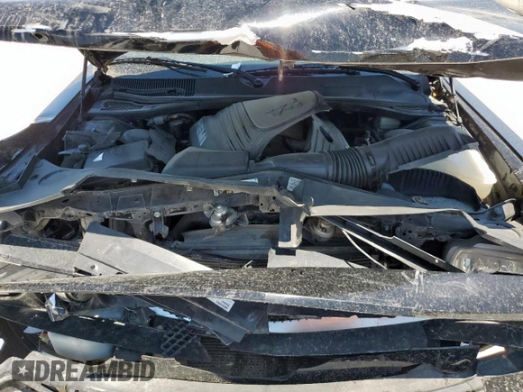 2014 Dodge Challenger R/T Plus z VIN 2C3CDYBT0EH122467, wystawiony jako Copart lot #58392365 z przebiegiem 136 793 mil mil oraz Szkoda całkowita • Salvage title. Historia ofert i sprzedaży dostępna na DreamBid. Obrazek 11.