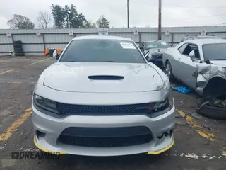 2019 Dodge Charger R/T with VIN 2C3CDXCTXKH757197, listed as a IAAI auction lot 41860544 with 98,820 mi miles and . Bid and sale history available at DreamBid. Image 12.
