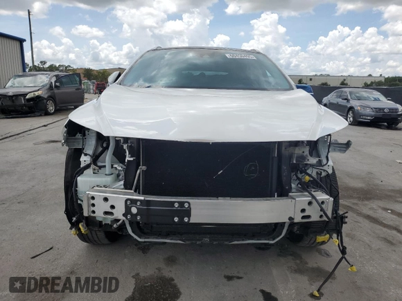 2021 Lexus RX 350 with VIN 2T2JZMDA5MC299559, listed as a Copart auction lot 60450495 with 24,390 mi miles and Salvage title. Bid and sale history available at DreamBid. Image 5.