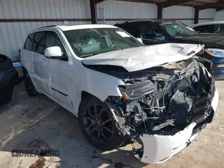 2020 Jeep Grand Cherokee Overland with VIN 1C4RJFCG4LC158425, listed as a IAAI auction lot 41386418 with 86,012 mi miles and . Bid and sale history available at DreamBid. Image 1.