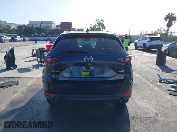 2019 Mazda CX-5 Touring with VIN JM3KFACM7K1534905, listed as a IAAI auction lot 41945607 with 56,014 mi miles. Bid and sale history available at carsss.com. Image 17.