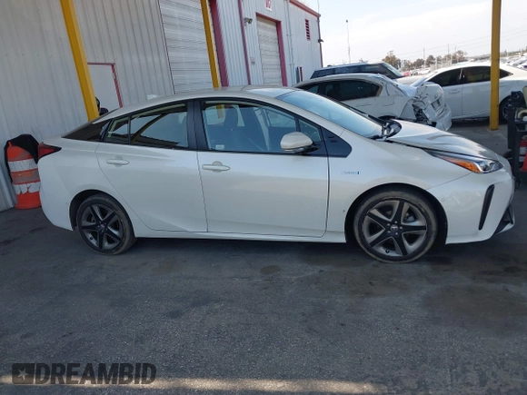 2020 Toyota Prius L Eco z VIN JTDKARFU4L3116504, wystawiony jako IAAI lot #42178279 z przebiegiem 33 668 mil mil oraz . Historia ofert i sprzedaży dostępna na DreamBid. Obrazek 13.