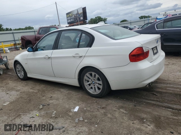 2007 BMW 3 Series 328i with VIN WBAVA37577NL15653, listed as a Copart auction lot 58705125 with 189,255 mi miles and Salvage title. Bid and sale history available at DreamBid. Image 2.