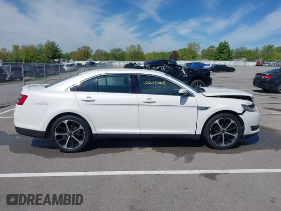 2016 Ford Taurus SEL with VIN 1FAHP2E88GG131659, listed as a IAAI auction lot 42205065 with 99,416 mi miles and . Bid and sale history available at DreamBid. Image 13.