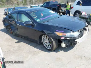 2010 Acura TSX with VIN JH4CU2F69AC031819, listed as a IAAI auction lot 42080516 with 233,042 mi miles. Bid and sale history available at carsss.com. Image 1.