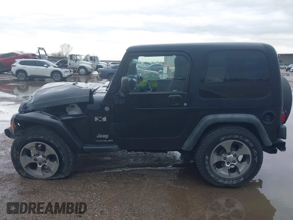 2004 Jeep Wrangler X with VIN 1J4FA39S34P753865, listed as a IAAI auction lot 41948545 with 198,169 mi miles. Bid and sale history available at carsss.com. Image 14.