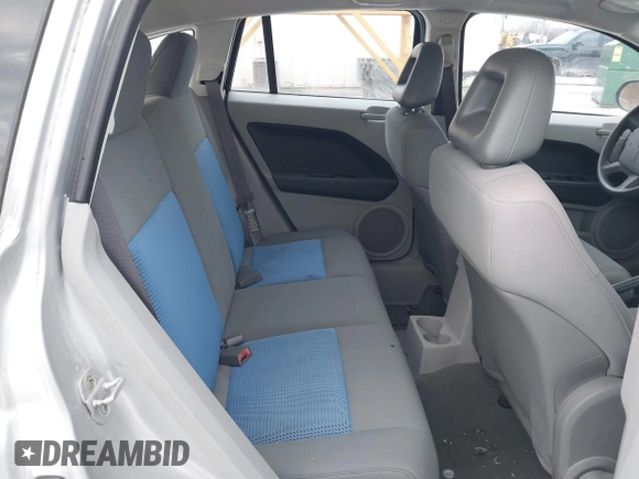 2007 Dodge Caliber SXT with VIN 1B3HB48B07D159549, listed as a IAAI auction lot 41330969 with 124,911 mi miles and . Bid and sale history available at DreamBid. Image 8.