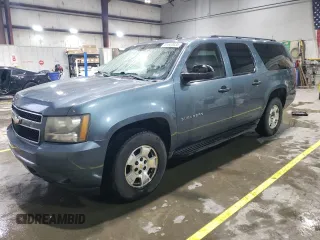 2010 Chevrolet Suburban LS z VIN 1GNUKHE39AR233277, wystawiony jako Copart lot #51633035 z przebiegiem 242 598 mil mil oraz Czysty tytuł • Clean title. Historia ofert i sprzedaży dostępna na DreamBid. Obrazek 1.