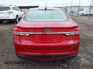 2017 Ford Fusion SE z VIN 3FA6P0H98HR175087, wystawiony jako IAAI lot #41557481 z przebiegiem 103 752 mil mil oraz . Historia ofert i sprzedaży dostępna na DreamBid. Obrazek 16.