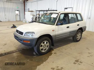 1997 Toyota RAV4 with VIN JT3HP10V5V7027939, listed as a IAAI auction lot 41837092 with 205,273 mi miles and . Bid and sale history available at DreamBid. Image 2.