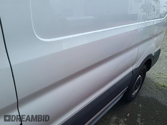 2016 Ford Transit Cargo with VIN 1FTYE1ZM1GKA06047, listed as a IAAI auction lot 42679265 with 124,601 mi miles and . Bid and sale history available at DreamBid. Image 31.